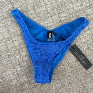 Triangl bikini bottom. Blue. Size Medium. NWT, never worn.